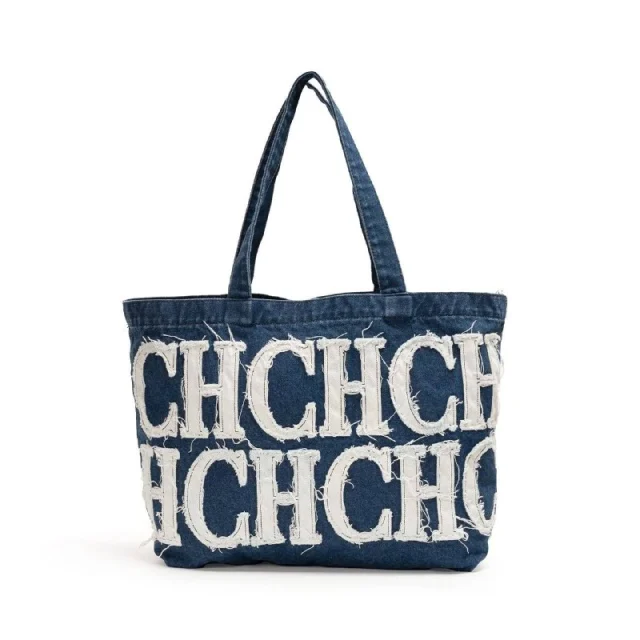CAROLINA HERRERA —->